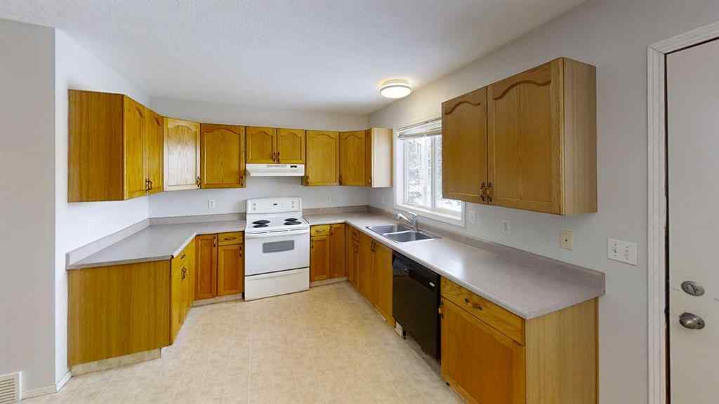 MLS® A2265279 - 9503 103 Avenue  in Hillside Grande Prairie, Multi-Family