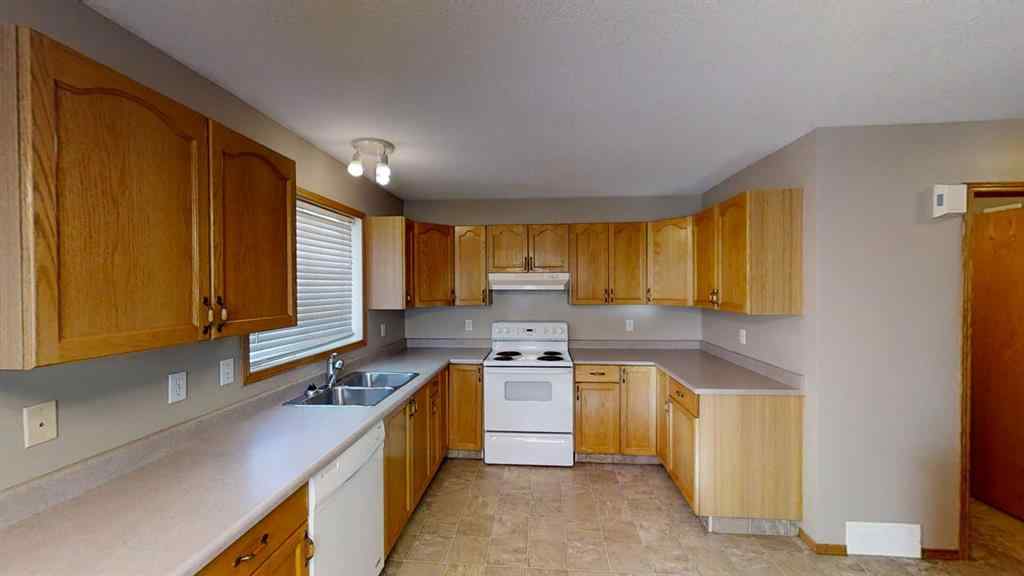 MLS® A2265279 - 9503 103 Avenue  in Hillside Grande Prairie, Multi-Family