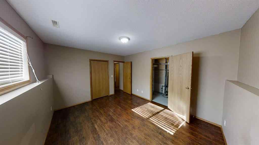 MLS® A2265279 - 9503 103 Avenue  in Hillside Grande Prairie, Multi-Family