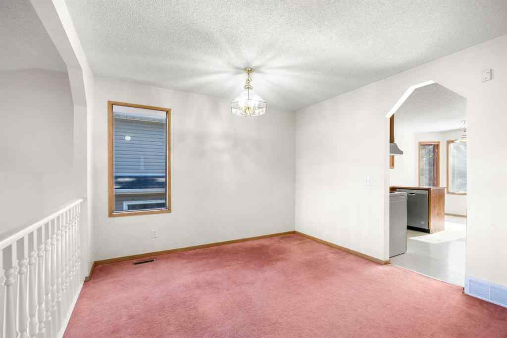 MLS® A2265282 - 51 Macewan Park Rise NW in MacEwan Glen Calgary, Residential