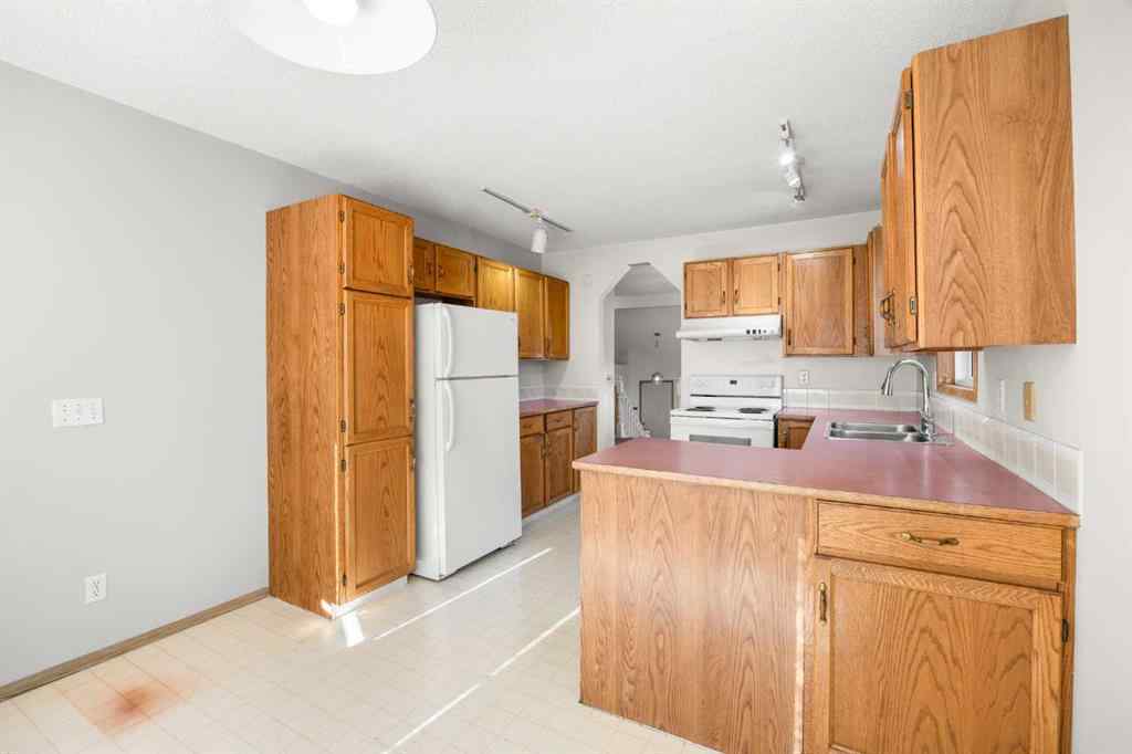 MLS® A2265282 - 51 Macewan Park Rise NW in MacEwan Glen Calgary, Residential