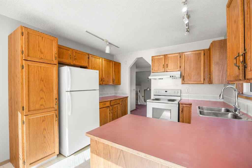 MLS® A2265282 - 51 Macewan Park Rise NW in MacEwan Glen Calgary, Residential