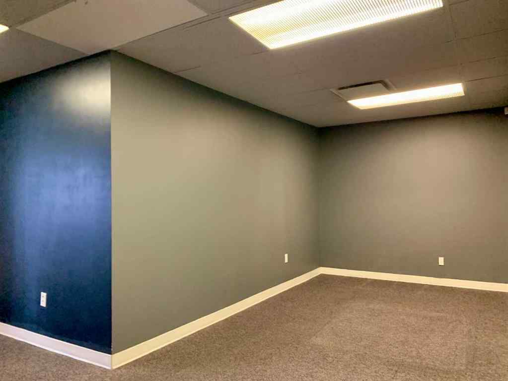 MLS® A2265284 - Unit #209 602 16 Avenue NW in Mount Pleasant Calgary, Commercial