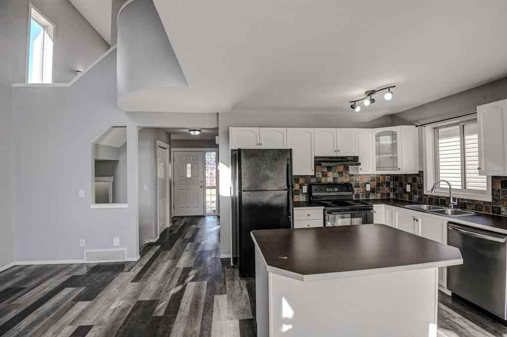 MLS® A2265291 - 61 Everstone Avenue SW in Evergreen Calgary, Residential