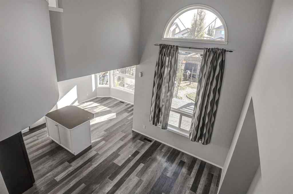 MLS® A2265291 - 61 Everstone Avenue SW in Evergreen Calgary, Residential