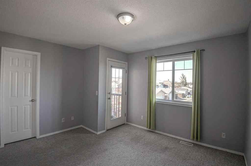 MLS® A2265291 - 61 Everstone Avenue SW in Evergreen Calgary, Residential