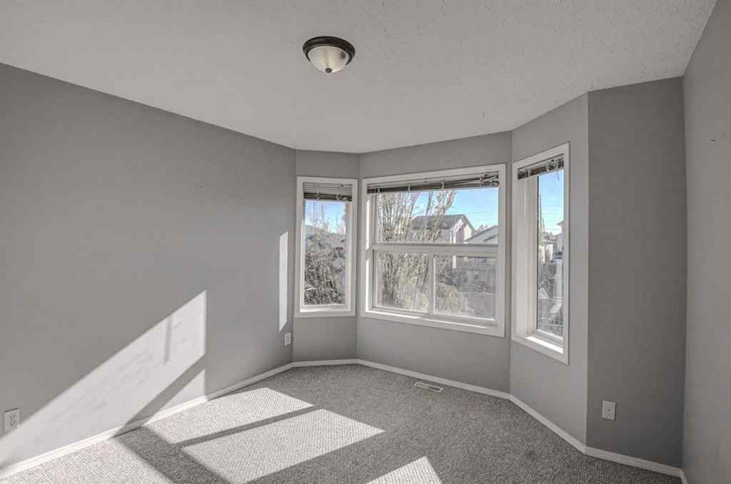 MLS® A2265291 - 61 Everstone Avenue SW in Evergreen Calgary, Residential