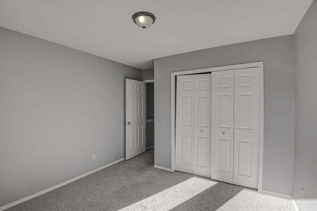 MLS® A2265291 - 61 Everstone Avenue SW in Evergreen Calgary, Residential