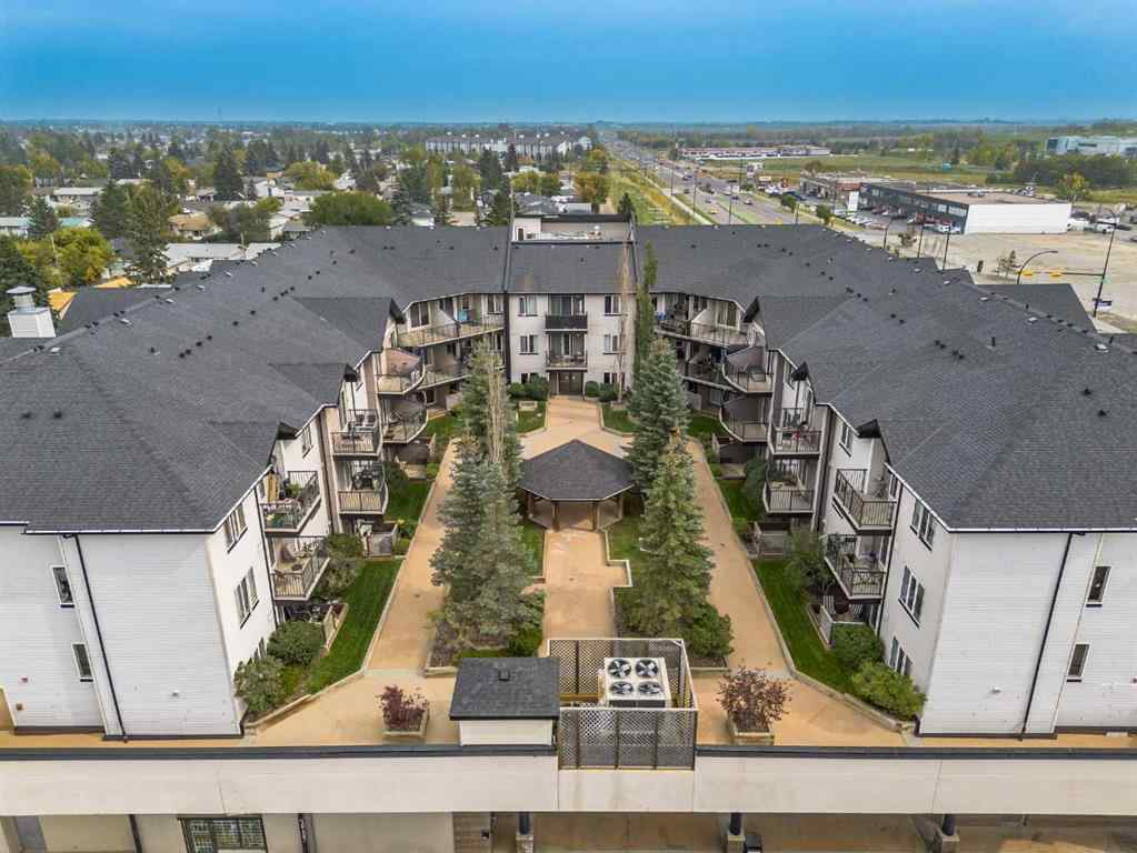 MLS® A2265312 - Unit #401 1727 54 Street SE in Penbrooke Meadows Calgary, Residential
