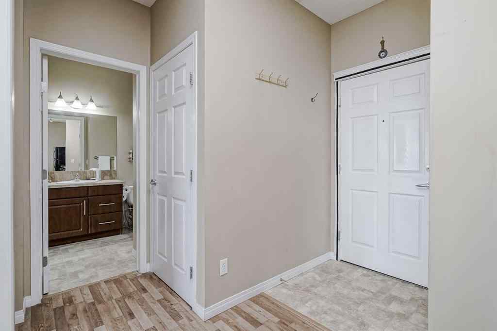 MLS® A2265312 - Unit #401 1727 54 Street SE in Penbrooke Meadows Calgary, Residential