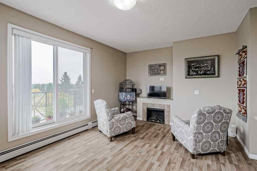 MLS® A2265312 - Unit #401 1727 54 Street SE in Penbrooke Meadows Calgary, Residential