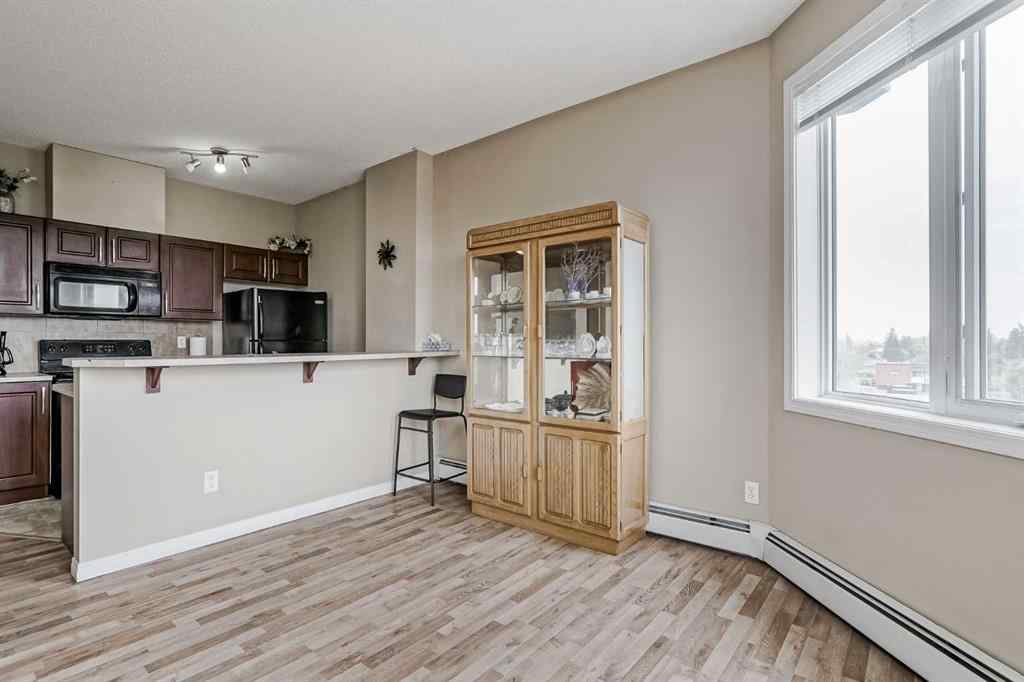 MLS® A2265312 - Unit #401 1727 54 Street SE in Penbrooke Meadows Calgary, Residential