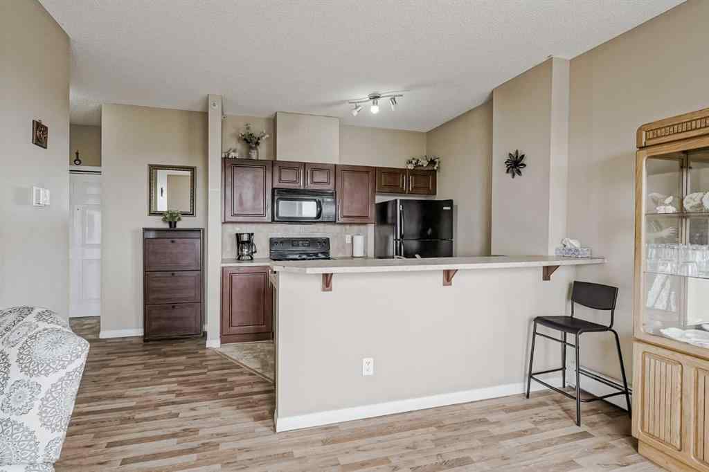MLS® A2265312 - Unit #401 1727 54 Street SE in Penbrooke Meadows Calgary, Residential