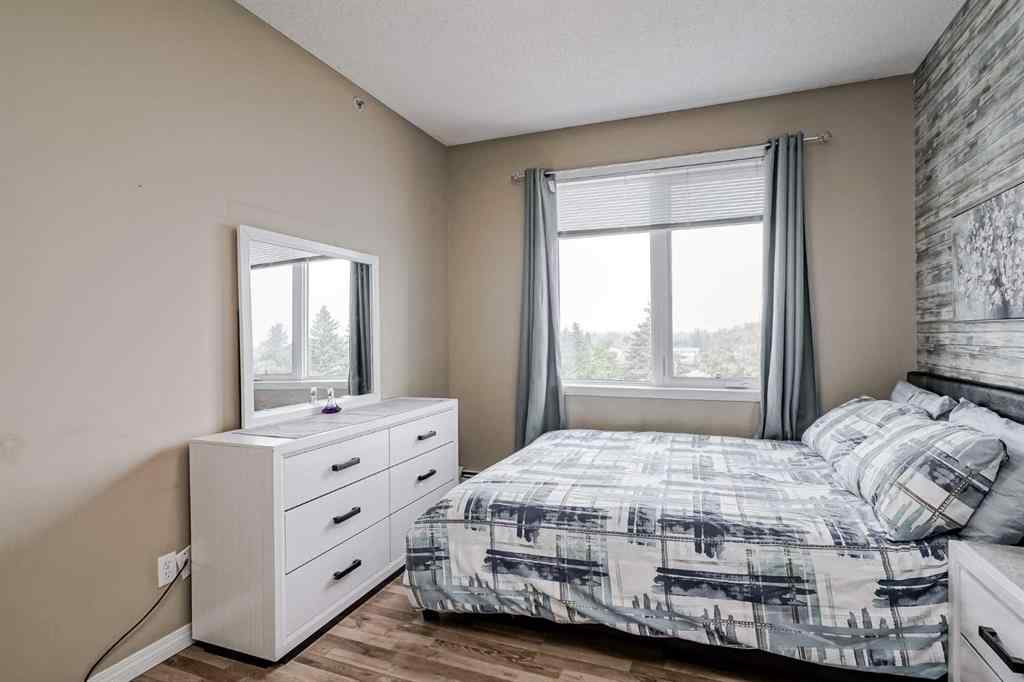 MLS® A2265312 - Unit #401 1727 54 Street SE in Penbrooke Meadows Calgary, Residential