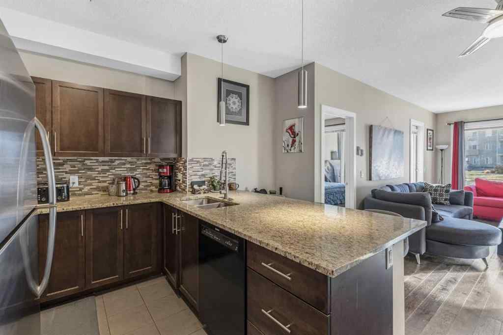 MLS® A2265320 - Unit #2127 604 East Lake Boulevard NE in East Lake Industrial Airdrie, Residential