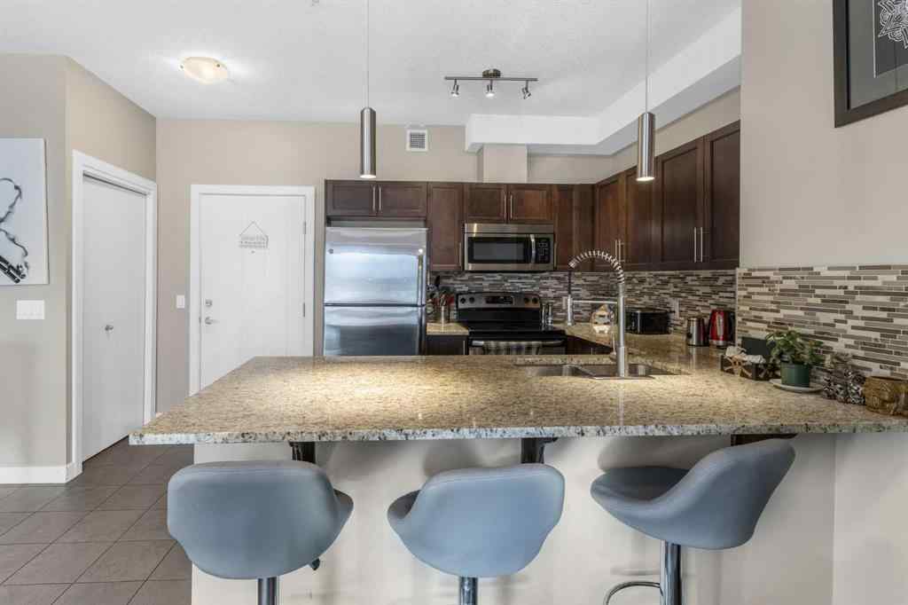 MLS® A2265320 - Unit #2127 604 East Lake Boulevard NE in East Lake Industrial Airdrie, Residential