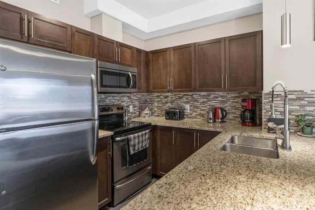 MLS® A2265320 - Unit #2127 604 East Lake Boulevard NE in East Lake Industrial Airdrie, Residential