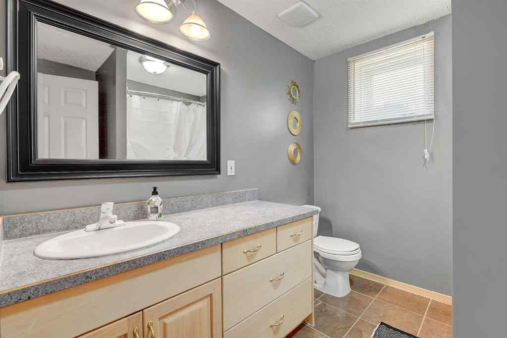 MLS® A2265322 - 10659 81 Avenue  in Mission Heights Grande Prairie, Residential