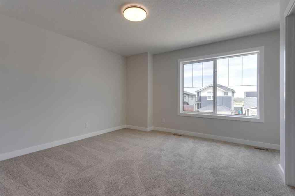 MLS® A2265334 - 304 Edith Place NW in Glacier Ridge Calgary, Residential