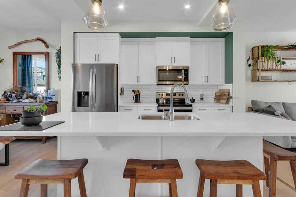 MLS® A2265335 - 374 Sundown Road  in Sunset Ridge Cochrane, Residential