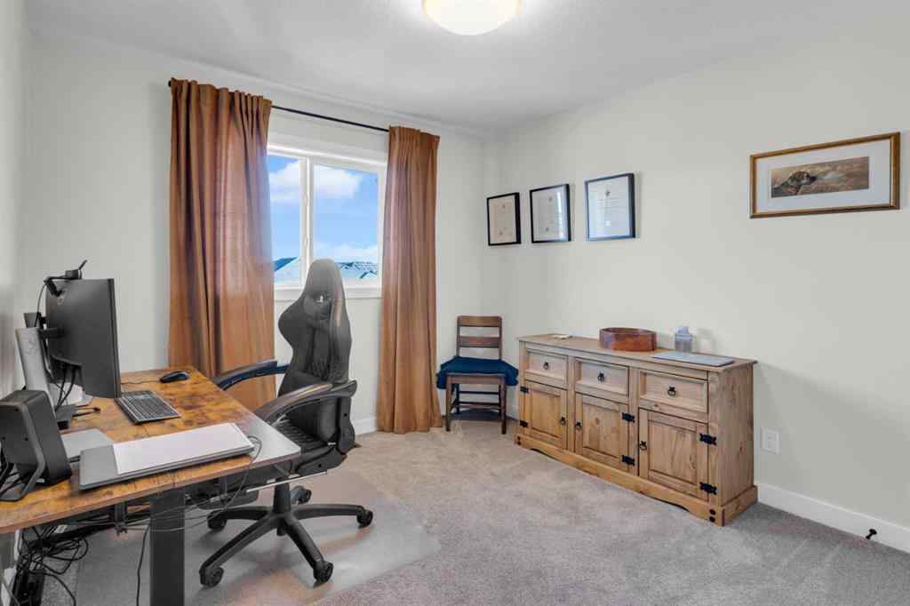 MLS® A2265335 - 374 Sundown Road  in Sunset Ridge Cochrane, Residential