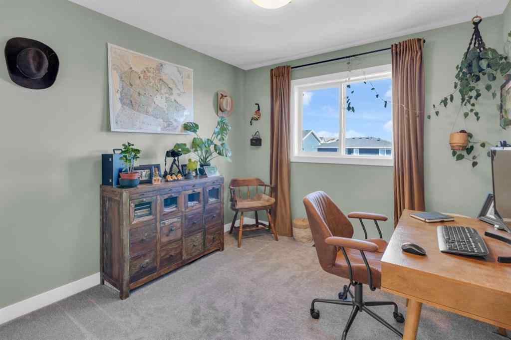 MLS® A2265335 - 374 Sundown Road  in Sunset Ridge Cochrane, Residential