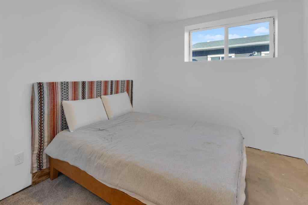 MLS® A2265335 - 374 Sundown Road  in Sunset Ridge Cochrane, Residential