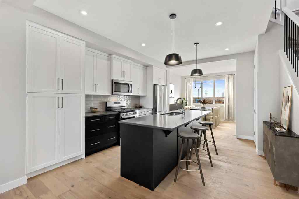 MLS® A2265343 - 334 Sundown Road  in Sunset Ridge Cochrane, Residential