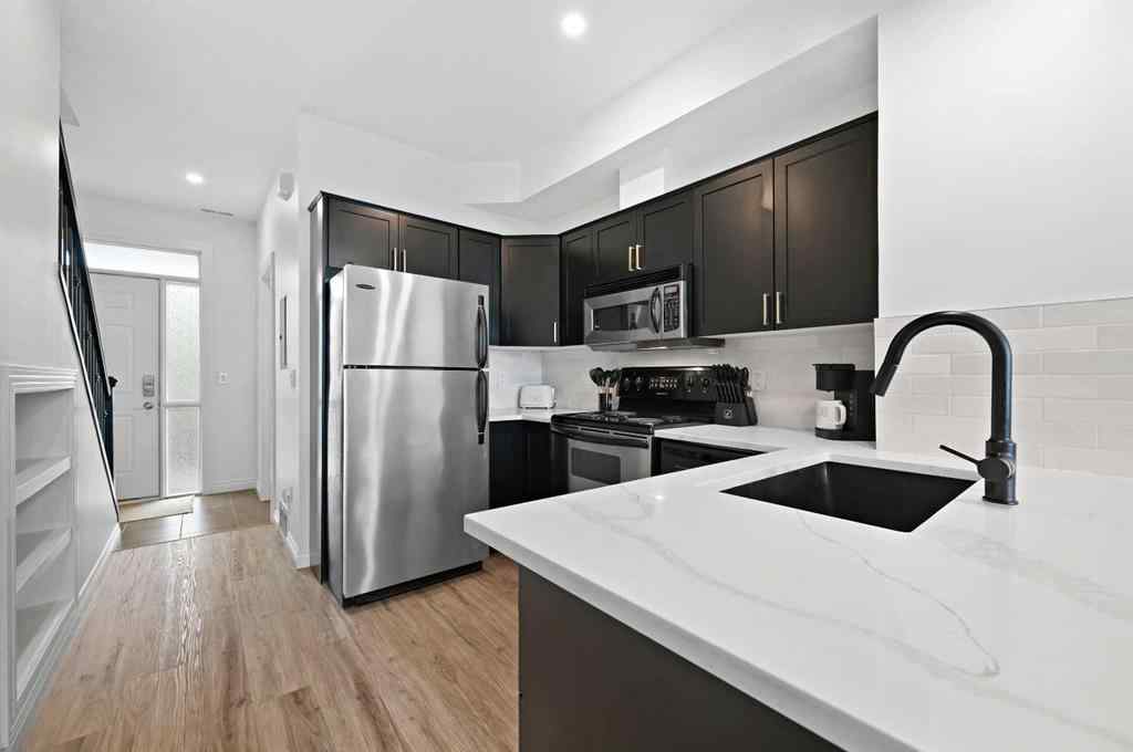 MLS® A2265358 - Unit #13 108 Rockyledge View NW in Rocky Ridge Calgary, Residential