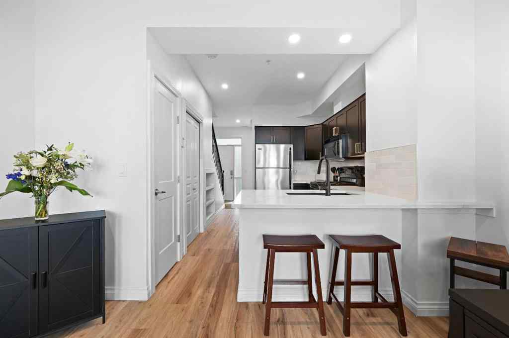 MLS® A2265358 - Unit #13 108 Rockyledge View NW in Rocky Ridge Calgary, Residential