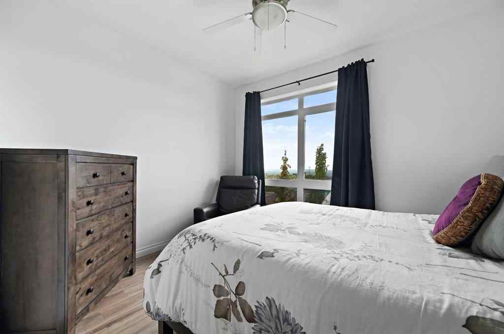 MLS® A2265358 - Unit #13 108 Rockyledge View NW in Rocky Ridge Calgary, Residential