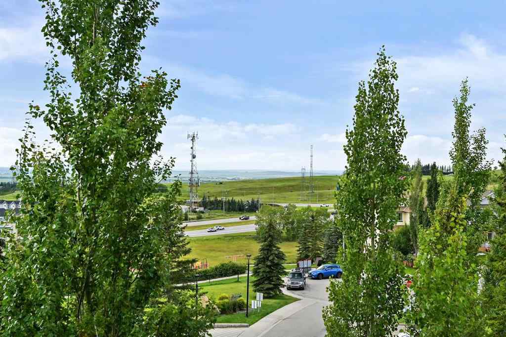 MLS® A2265358 - Unit #13 108 Rockyledge View NW in Rocky Ridge Calgary, Residential