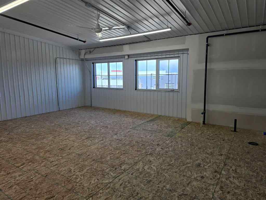 MLS® A2265360 - Unit #209 5 River Heights Drive  in The Willows Cochrane, Commercial