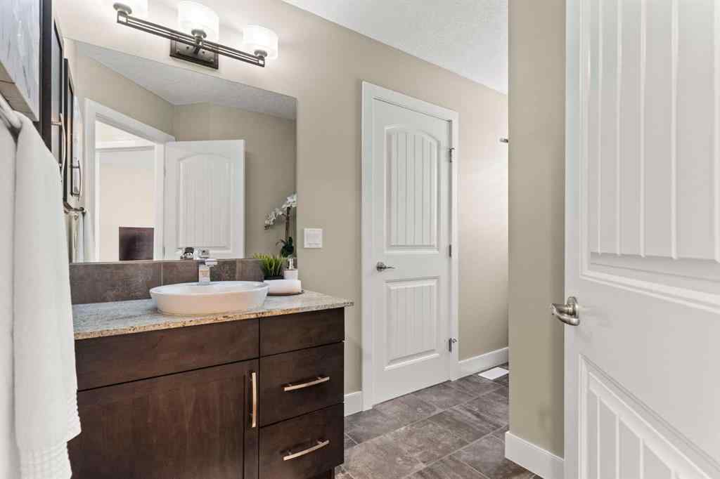 MLS® A2265373 - 809 Canoe Green SW in Canals Airdrie, Residential