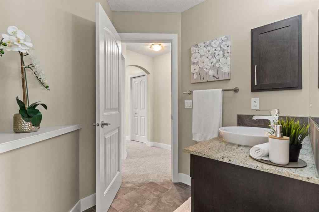 MLS® A2265373 - 809 Canoe Green SW in Canals Airdrie, Residential