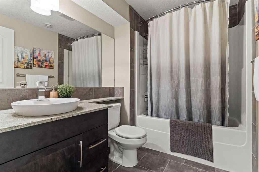 MLS® A2265373 - 809 Canoe Green SW in Canals Airdrie, Residential