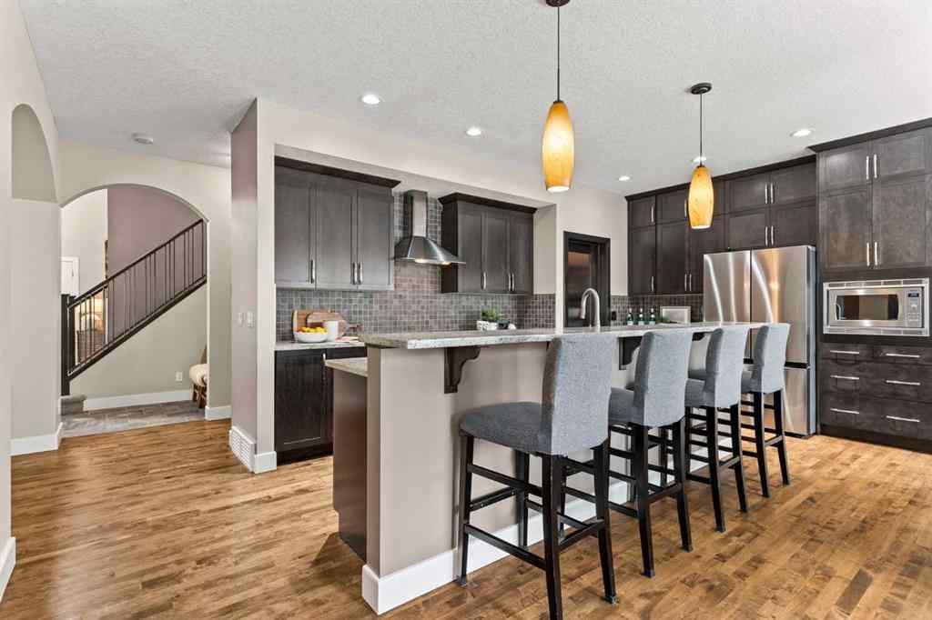 MLS® A2265373 - 809 Canoe Green SW in Canals Airdrie, Residential
