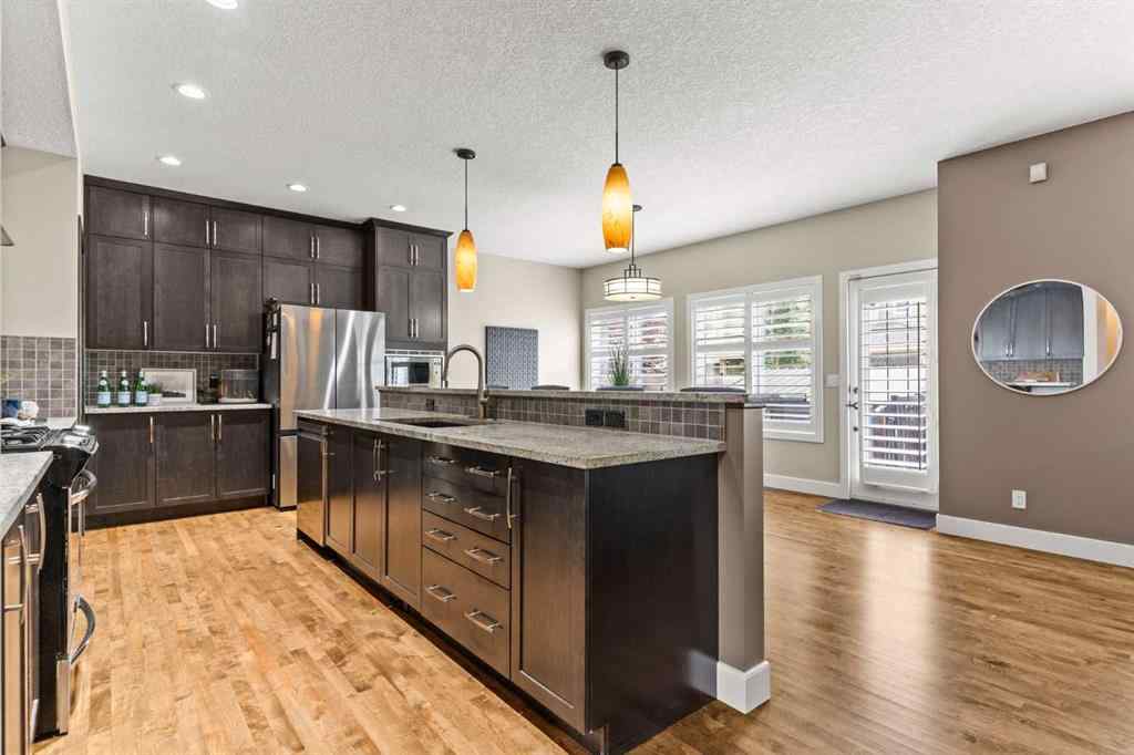 MLS® A2265373 - 809 Canoe Green SW in Canals Airdrie, Residential