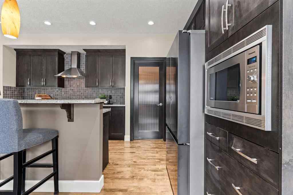 MLS® A2265373 - 809 Canoe Green SW in Canals Airdrie, Residential