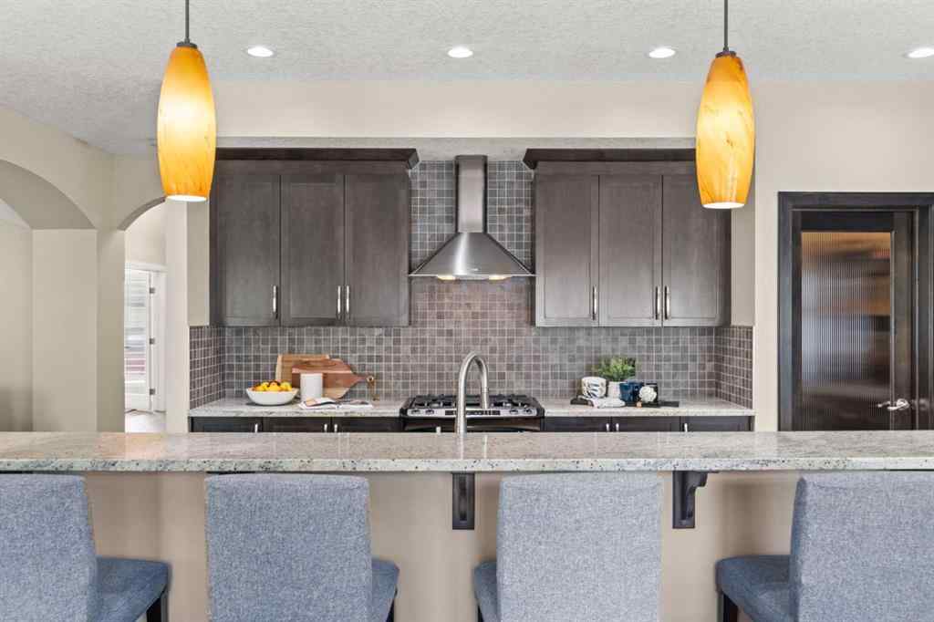 MLS® A2265373 - 809 Canoe Green SW in Canals Airdrie, Residential