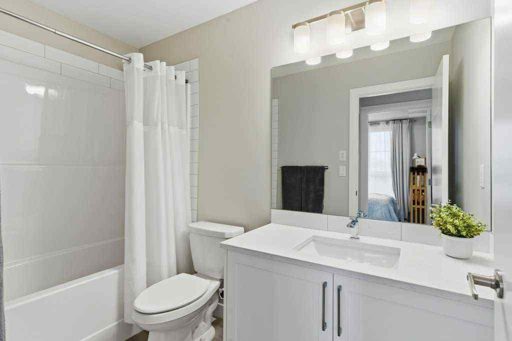 MLS® A2265387 - Unit #1107 100 Banister Drive  in Wedderburn Okotoks, Residential