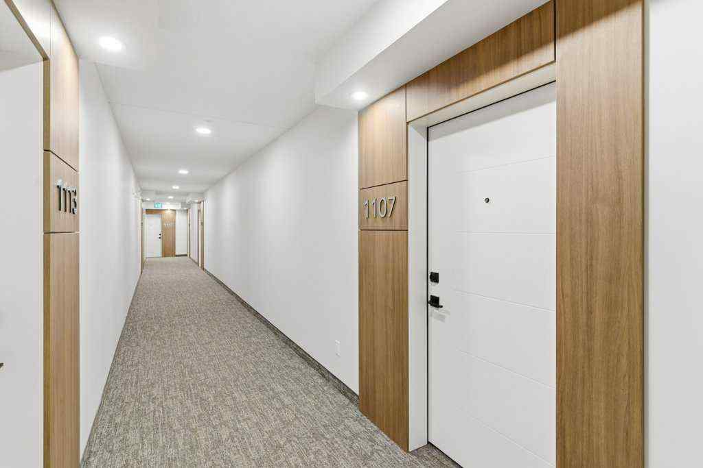 MLS® A2265387 - Unit #1107 100 Banister Drive  in Wedderburn Okotoks, Residential