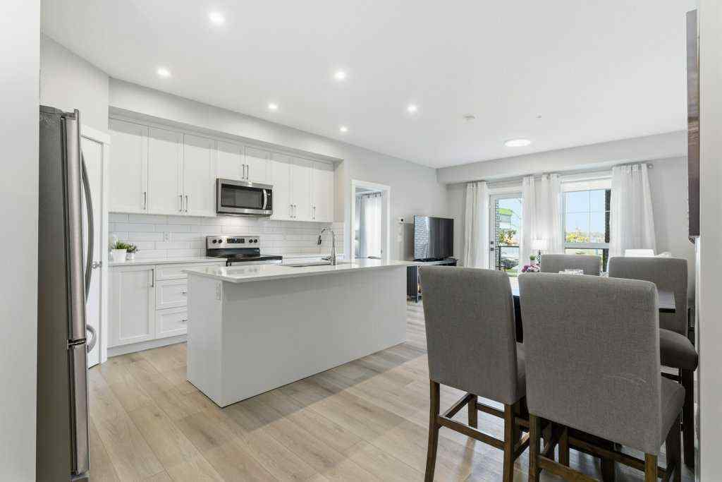 MLS® A2265387 - Unit #1107 100 Banister Drive  in Wedderburn Okotoks, Residential