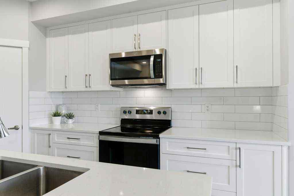 MLS® A2265387 - Unit #1107 100 Banister Drive  in Wedderburn Okotoks, Residential