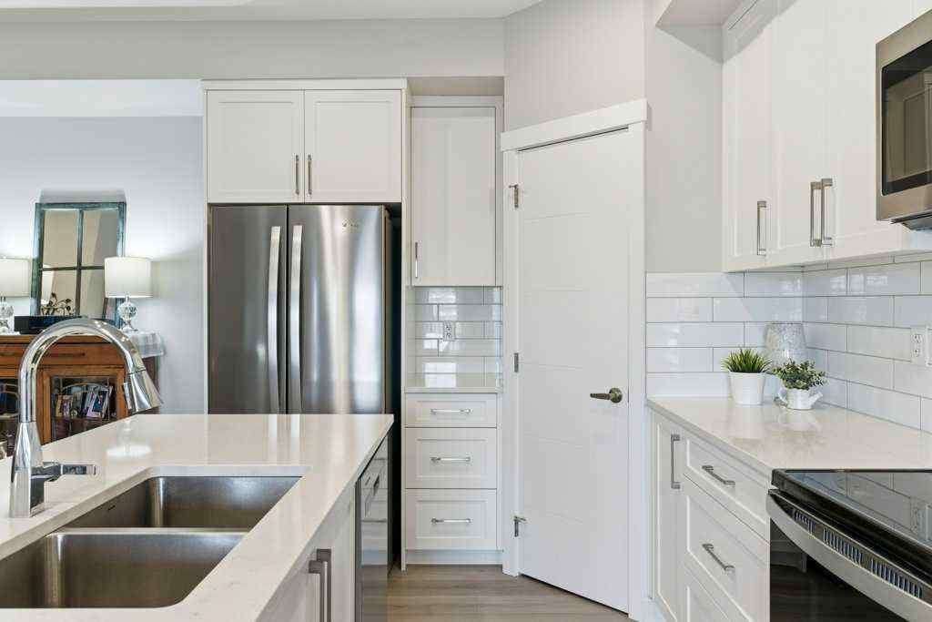 MLS® A2265387 - Unit #1107 100 Banister Drive  in Wedderburn Okotoks, Residential