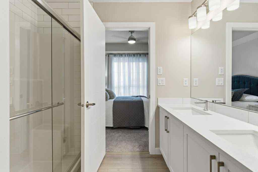 MLS® A2265387 - Unit #1107 100 Banister Drive  in Wedderburn Okotoks, Residential