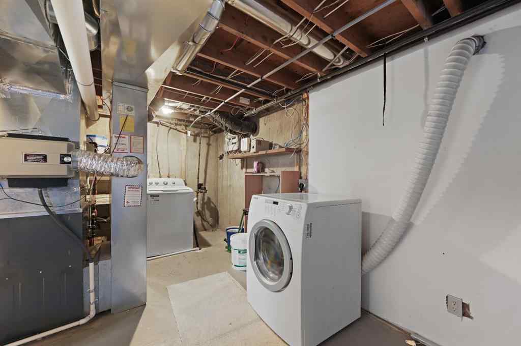 MLS® A2265392 - 571 Killarney Glen Court SW in Killarney/Glengarry Calgary, Residential