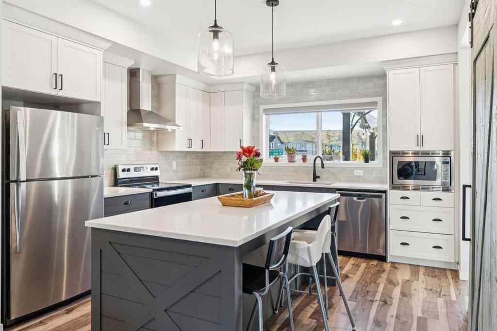 MLS® A2265398 - 67 Wolf Hollow Way SE in Wolf Willow Calgary, Residential