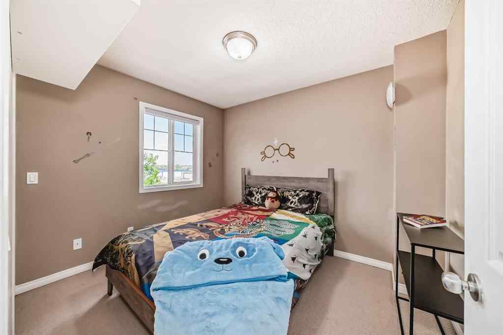 MLS® A2265399 - 423 Morningside Way SW in Morningside Airdrie, Residential