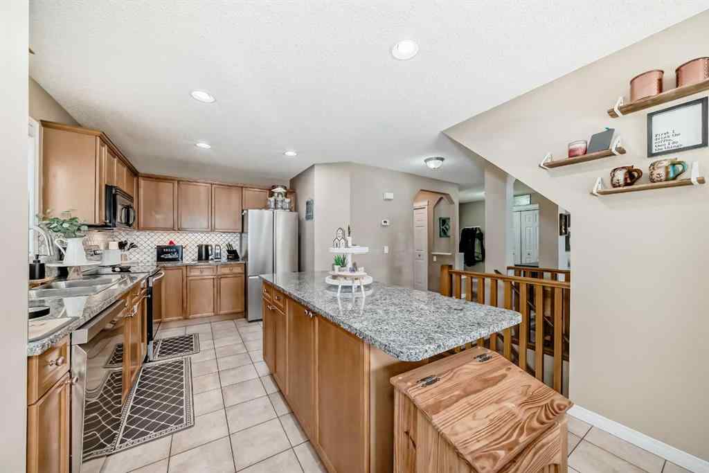 MLS® A2265399 - 423 Morningside Way SW in Morningside Airdrie, Residential